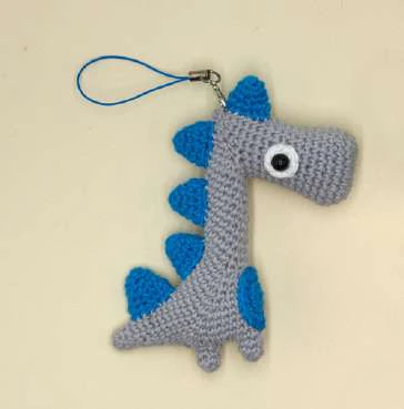 Dino Keychain visual from source page 10