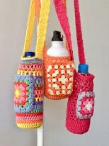Bottle holder with phone pocket