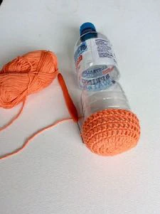 Bottle holder with phone pocket visual from source page 7