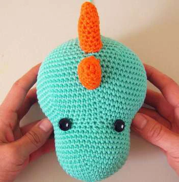 Dino backpack visual from source page 4