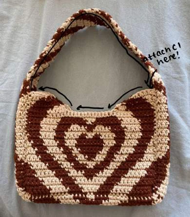 Heart shoulder bag visual from source page 22