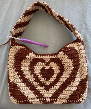 Heart shoulder bag visual from source page 22
